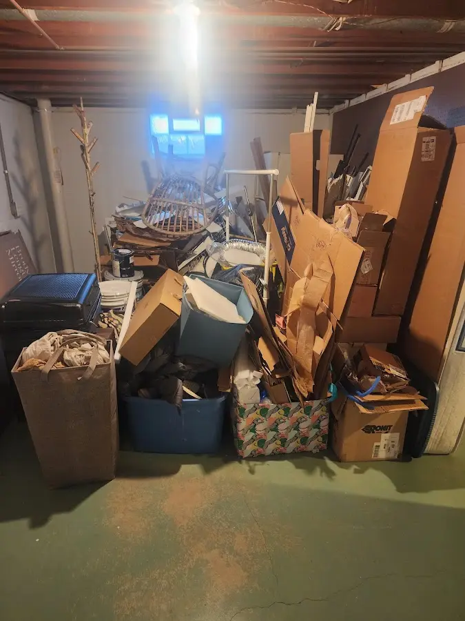 Roll-off dumpster container at job site for Yard Waste Dumpster Rental in Eagle Lake